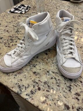 Nike White High-Top Sneakers with Gray Suede Toe and Yellow Tongue Tab